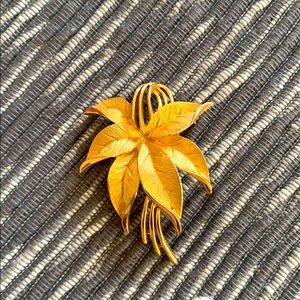 Gold tone leaf pin